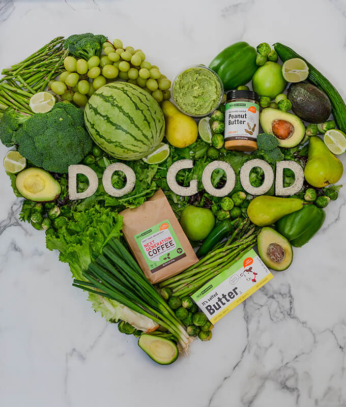green produce and products shaped like a heart with the words "Do Good" in the middle.