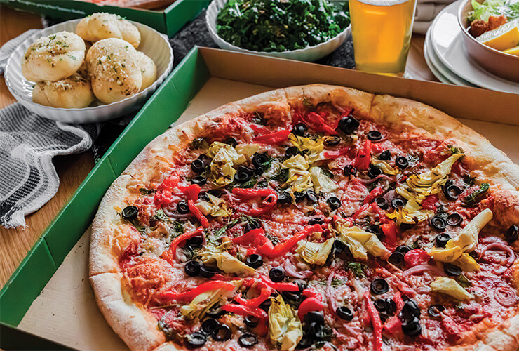 New Seasons PizzaNW deli pizza with a side of garlic knots.