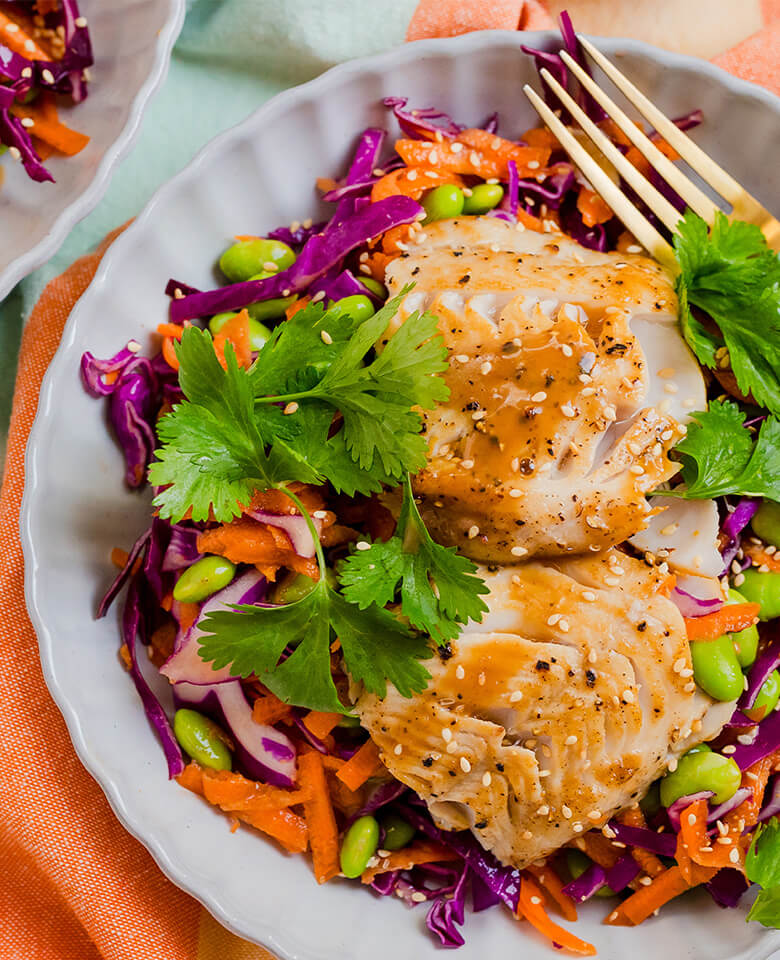 black cod with NSM stir fry sauce on a bed of vegetables