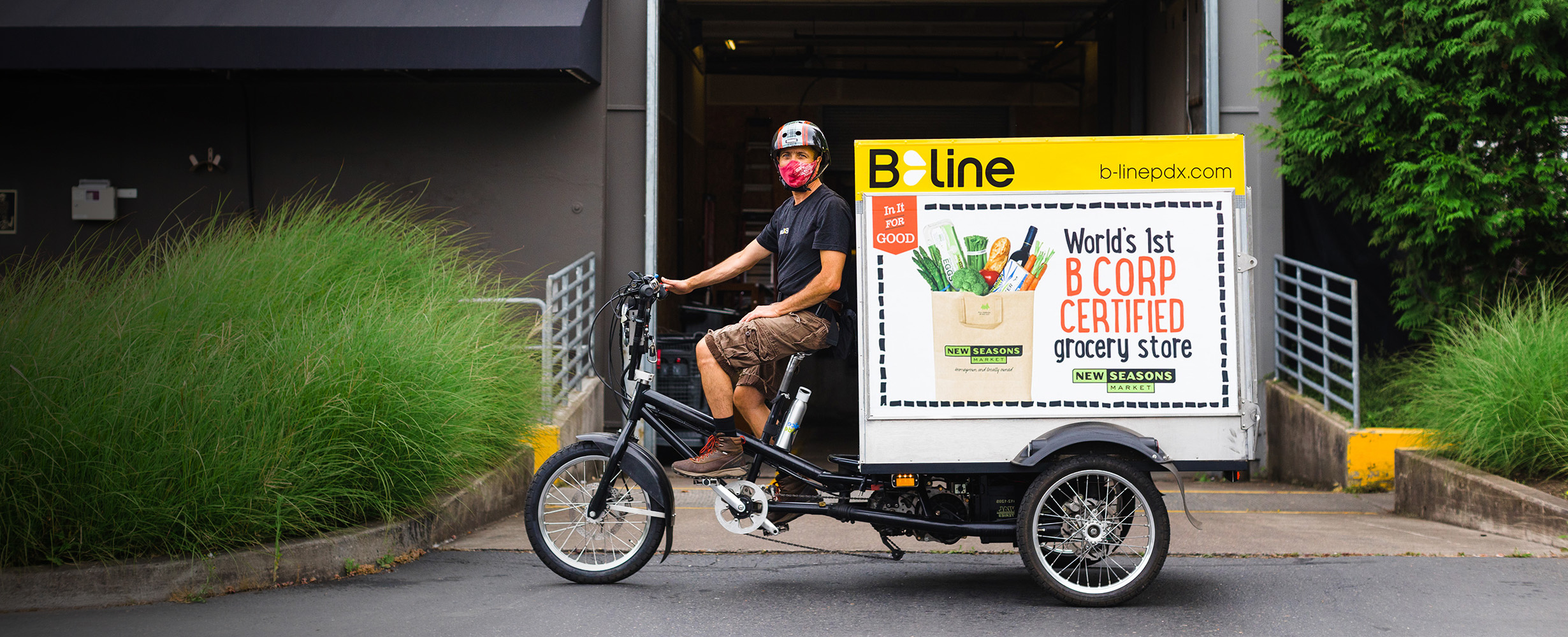 Bike messenger on a B-line bike for New Seasons Market